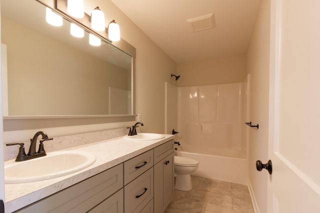 full bathroom featuring shower / bathtub combination, vanity, and toilet