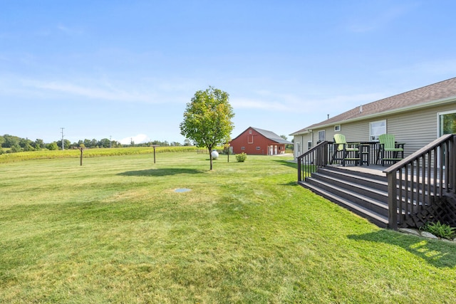 view of yard with a wooden deck