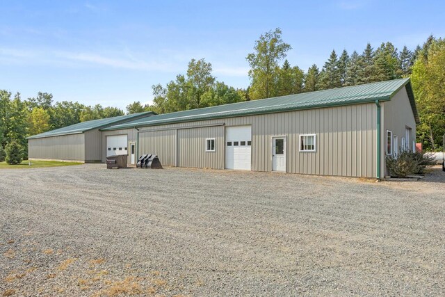 view of outdoor structure featuring a garage