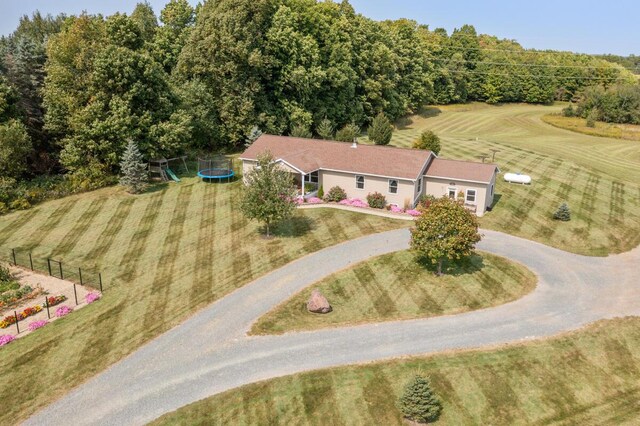 birds eye view of property with a rural view