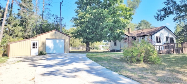 exterior space featuring an outdoor structure and a garage