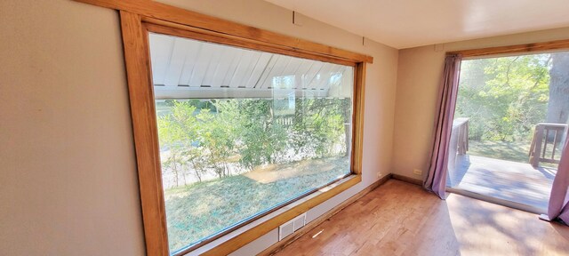 interior space with hardwood / wood-style flooring