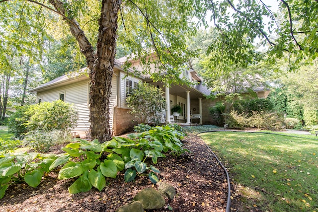 view of front of home with a front yard