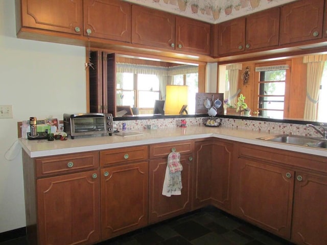 kitchen with sink and a wealth of natural light