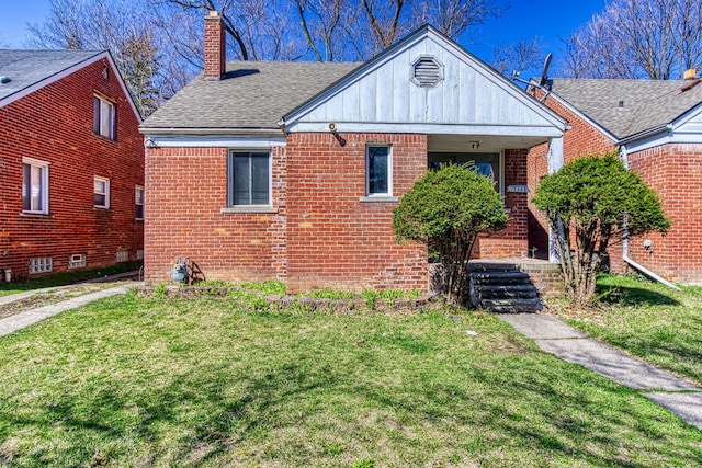 bungalow with a front lawn