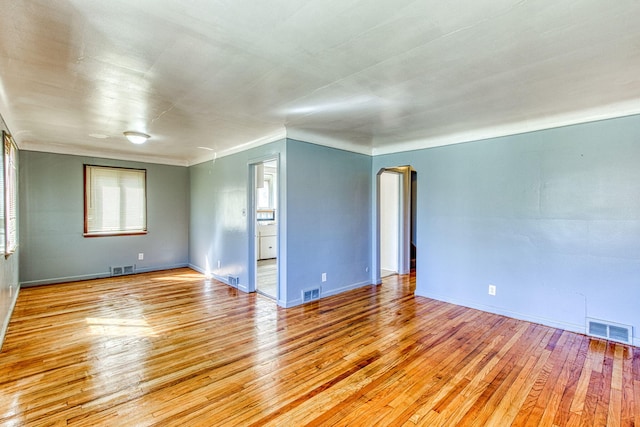 unfurnished room featuring light wood-type flooring