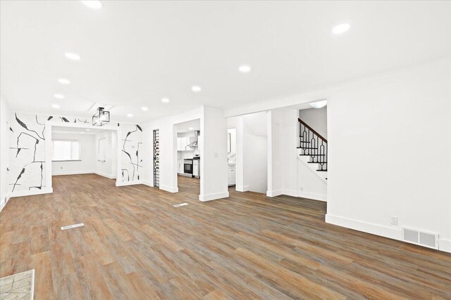 interior space with hardwood / wood-style flooring