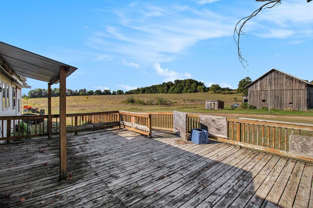 wooden terrace featuring a rural view