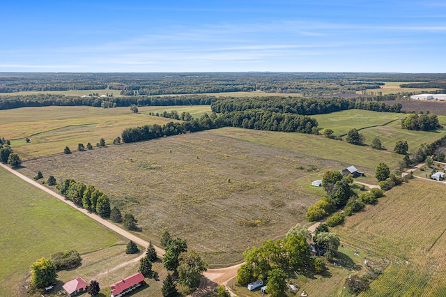 birds eye view of property featuring a rural view