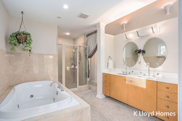 bathroom with vanity and plus walk in shower