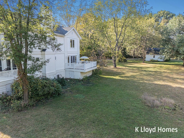 view of yard with a deck