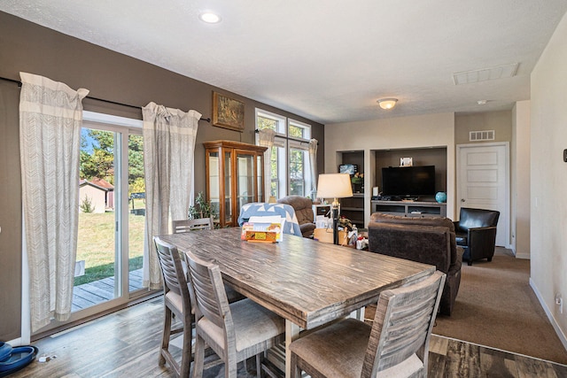 dining room featuring hardwood / wood-style flooring