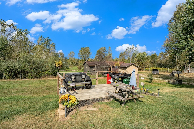 view of yard with a wooden deck