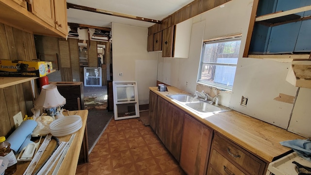 kitchen with dark parquet flooring and sink