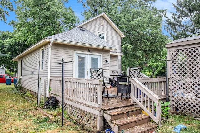 rear view of property with a deck