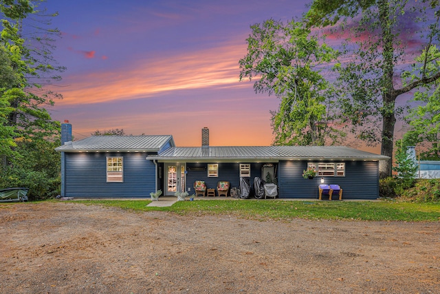 ranch-style house with a patio