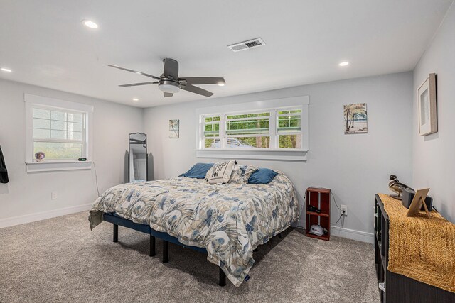 carpeted bedroom featuring ceiling fan