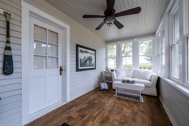 sunroom / solarium featuring ceiling fan and wooden ceiling