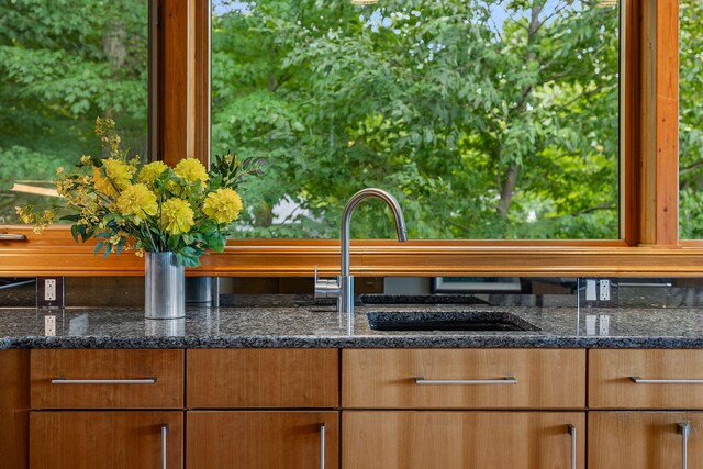 kitchen with dark stone counters