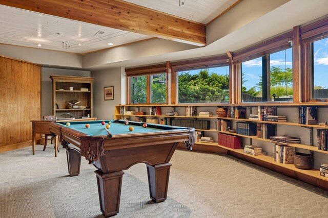 recreation room with wood walls, billiards, plenty of natural light, and carpet flooring