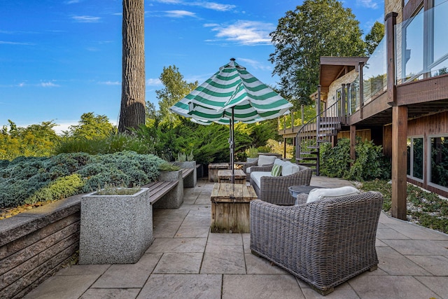 view of patio / terrace featuring an outdoor hangout area and a wooden deck