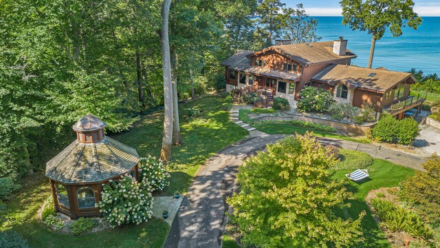 birds eye view of property featuring a water view