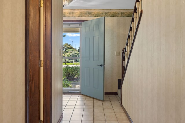 foyer featuring light tile patterned flooring