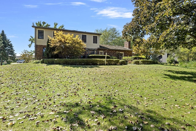 view of front of house with a front yard