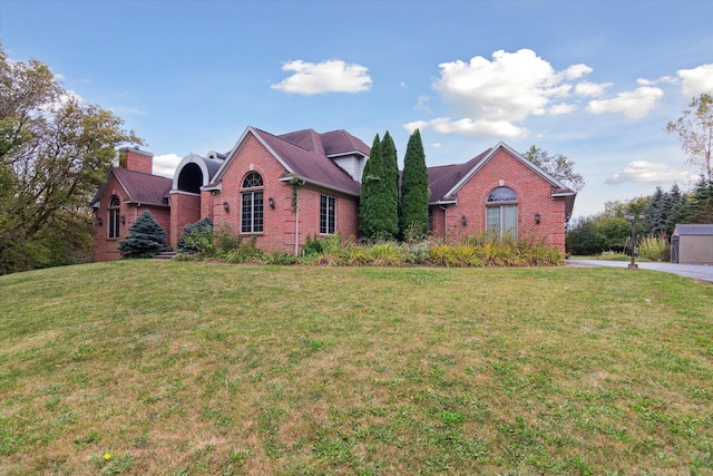 front facade with a front lawn