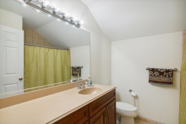 bathroom featuring toilet, vanity, lofted ceiling, tile patterned floors, and a shower with shower curtain