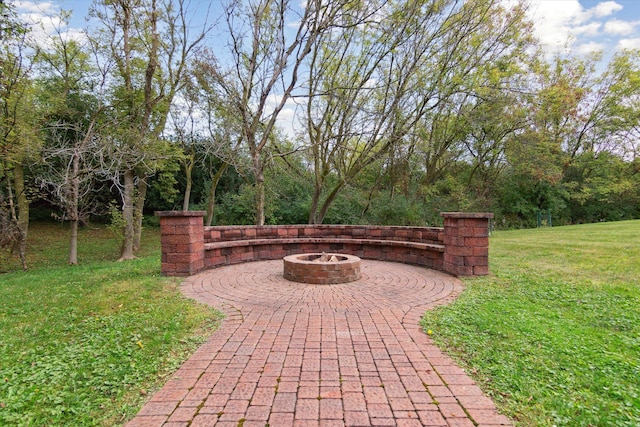 view of patio featuring a fire pit