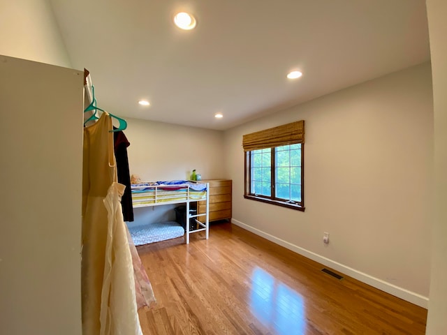 bedroom featuring wood-type flooring