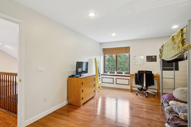 office space with hardwood / wood-style flooring