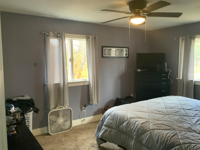 bedroom featuring carpet and ceiling fan