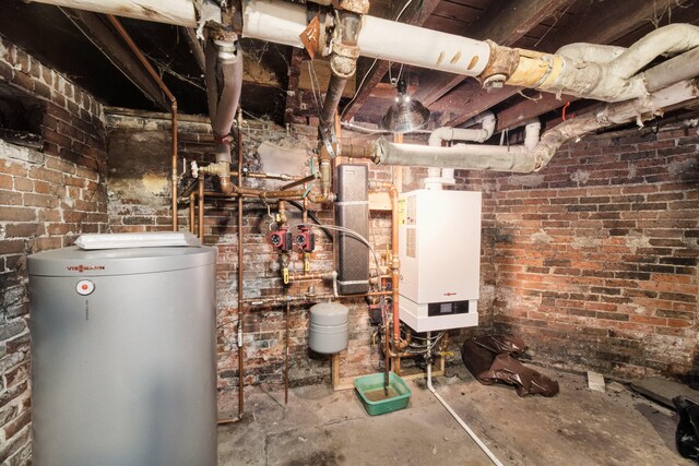 utility room with water heater