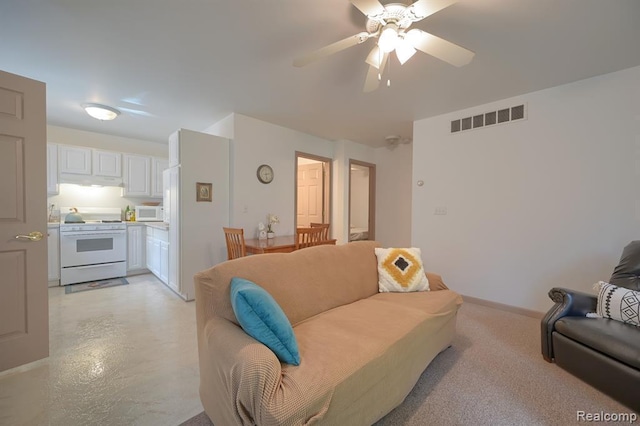 living room with ceiling fan