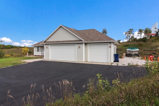 view of property exterior featuring a garage