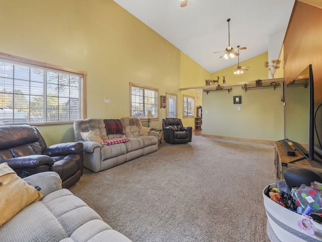 carpeted living room featuring ceiling fan and high vaulted ceiling