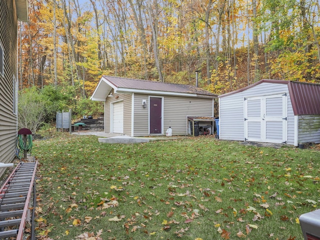 view of outbuilding with a lawn