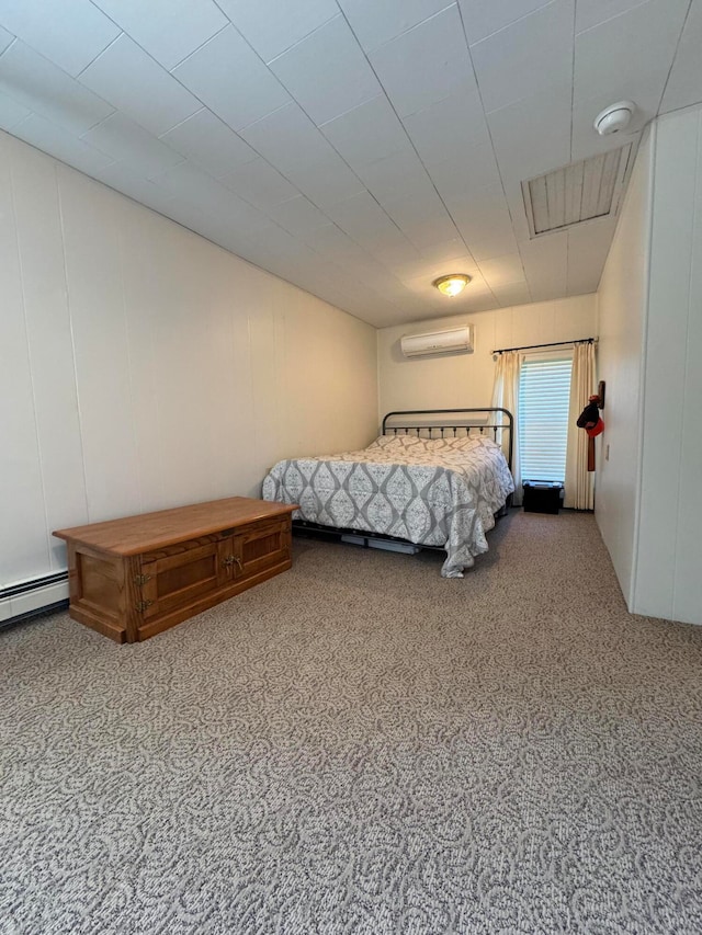 bedroom featuring a wall unit AC and carpet flooring