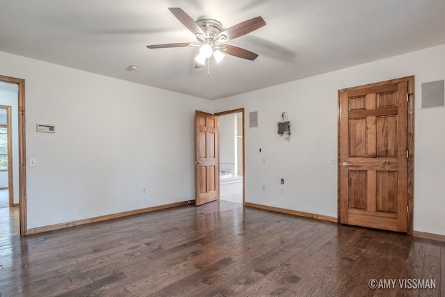 unfurnished room featuring dark hardwood / wood-style flooring and ceiling fan