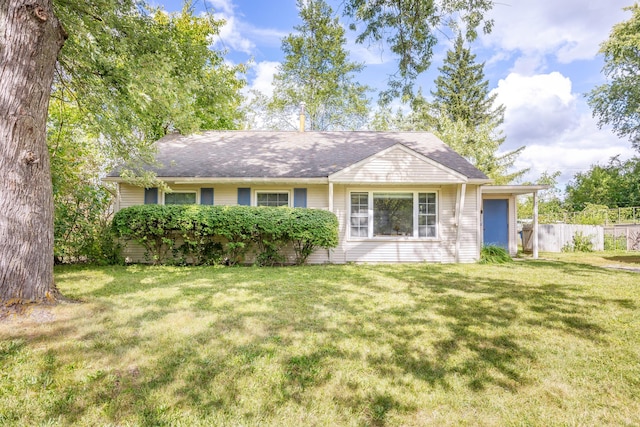 ranch-style house with a front yard