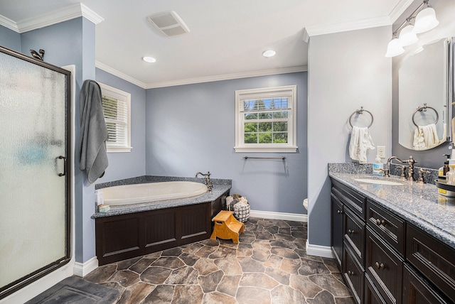 full bathroom featuring crown molding, toilet, vanity, and separate shower and tub