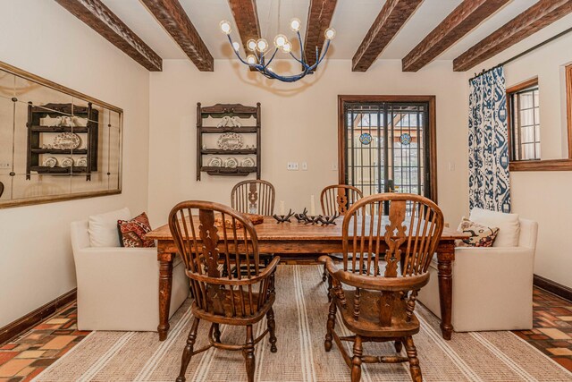 dining room featuring beamed ceiling and a chandelier