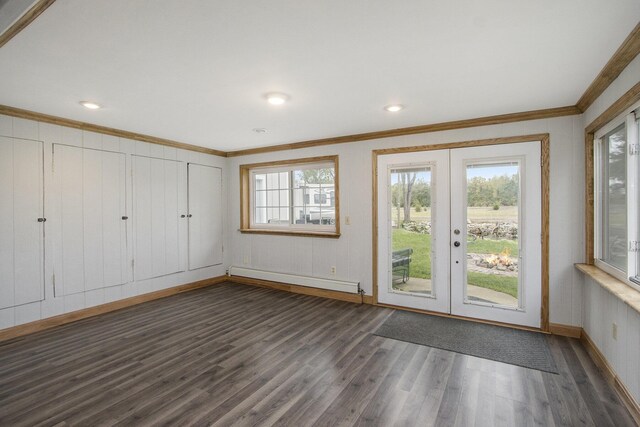 entryway featuring ornamental molding, a baseboard heating unit, french doors, and dark hardwood / wood-style flooring