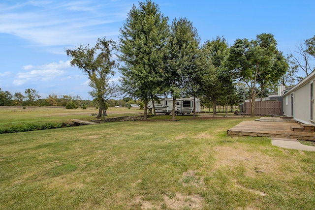 view of yard with a deck