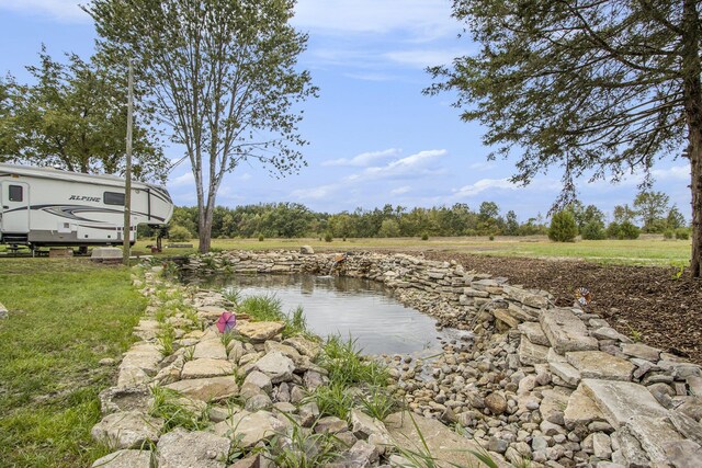 view of yard featuring a water view