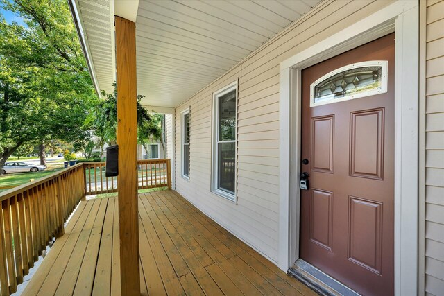 wooden deck featuring covered porch