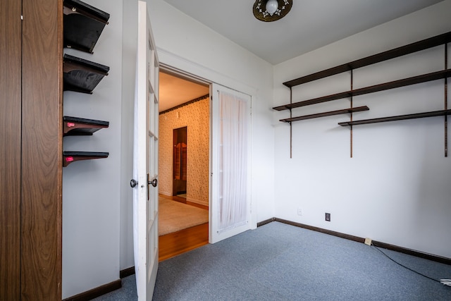 unfurnished bedroom with carpet floors