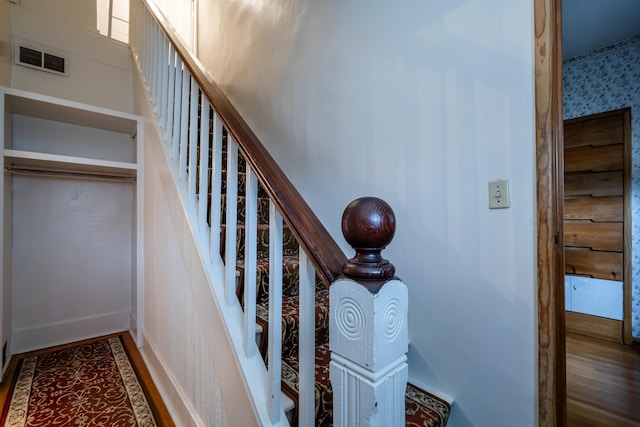 stairs with wood-type flooring